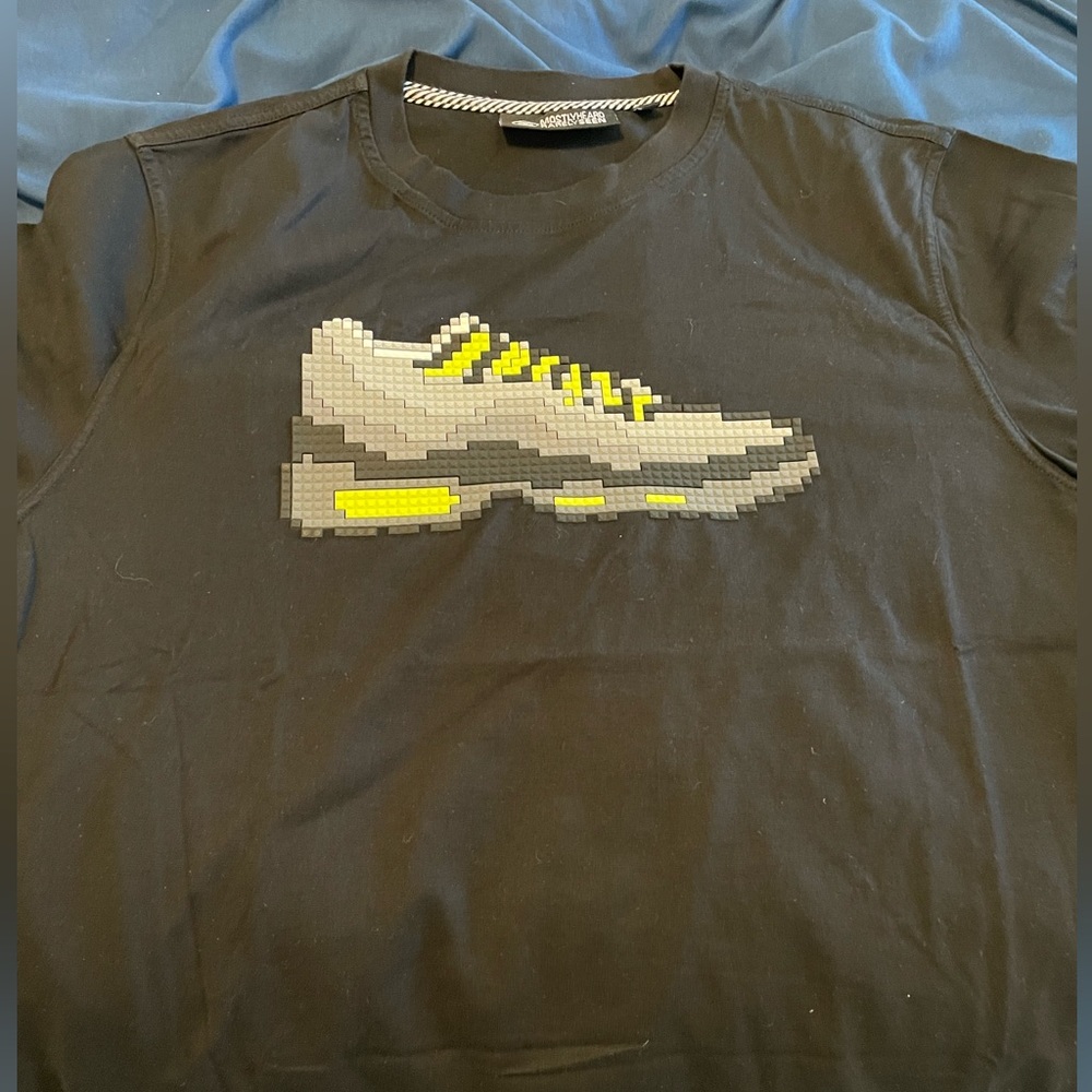 Mostly Heard Never Seen Tee